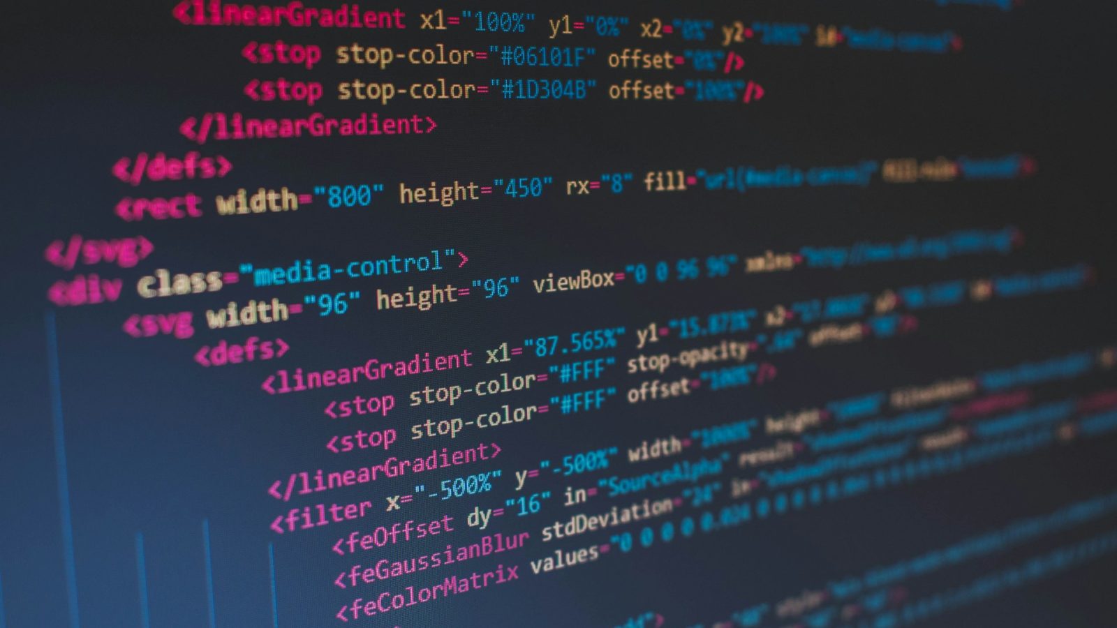 Screen showing SVG and CSS source code in a dark editor.